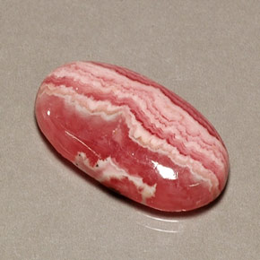 Rodocrosita multicolorido natural 13,08ct, corte oval, opaco