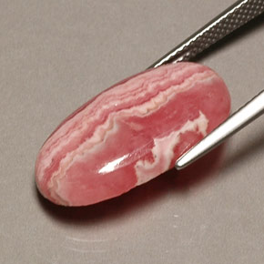 Rodocrosita multicolorido natural 13,08ct, corte oval, opaco