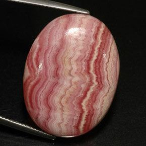 Rodocrosita multicolorido natural 36,43ct, corte oval, opaco