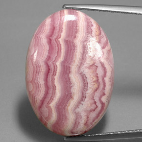 Rodocrosita multicolorido natural 35,26ct, corte oval, opaco