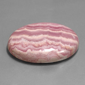 Rodocrosita multicolorido natural 35,26ct, corte oval, opaco