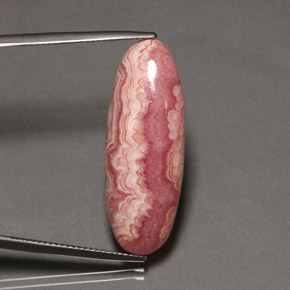 Rodocrosita multicolorido natural 19,58ct, corte oval, opaco