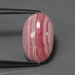 Rodocrosita multicolorido natural 6,80ct, corte oval, opaco