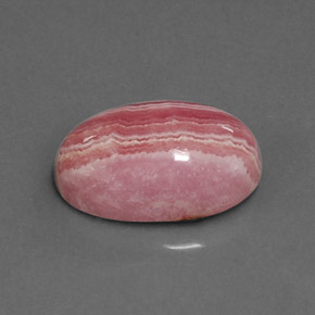 Rodocrosita multicolorido natural 6,80ct, corte oval, opaco