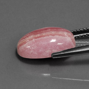 Rodocrosita multicolorido natural 6,80ct, corte oval, opaco