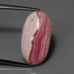 Rodocrosita multicolorido natural 9,97ct, corte oval, opaco