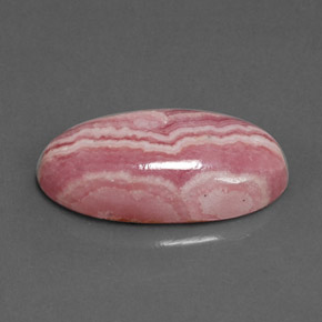 Rodocrosita multicolorido natural 9,70ct, corte oval, opaco