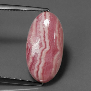 Rodocrosita multicolorido natural 9,70ct, corte oval, opaco