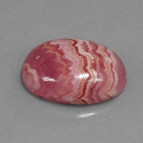 Rodocrosita multicolorido natural 7,26ct, corte oval, opaco