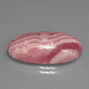 Rodocrosita multicolorido natural 15,90ct, corte oval, opaco