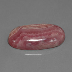 Rodocrosita rosa natural 13,76ct, corte oval, opaco