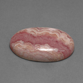 Rodocrosita rosa natural 17,68ct, corte oval, opaco