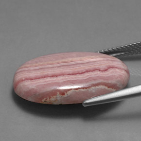 Rodocrosita rosa natural 16,47ct, corte oval, opaco