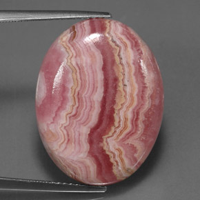 Rodocrosita multicolorido natural 24,57ct, corte oval, opaco