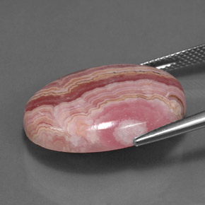 Rodocrosita multicolorido natural 24,57ct, corte oval, opaco