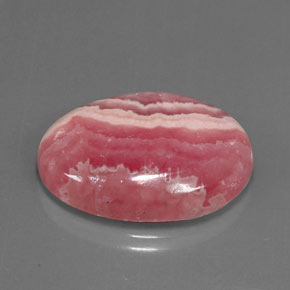 Rodocrosita multicolorido natural 26,18ct, corte oval, opaco