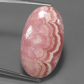 Rodocrosita multicolorido natural 22,52ct, corte oval, opaco