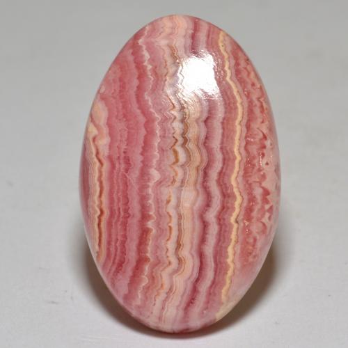 Rodocrosita multicolorido natural 30,65ct, corte oval, opaco