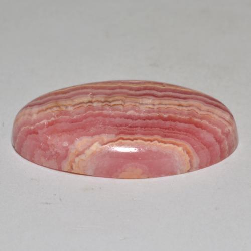 Rodocrosita multicolorido natural 30,65ct, corte oval, opaco