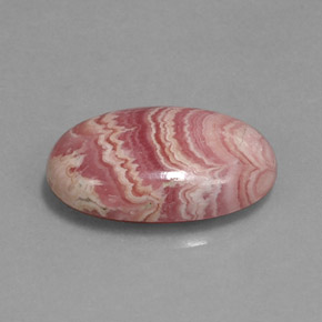 Rodocrosita multicolorido natural 12,81ct, corte oval, opaco