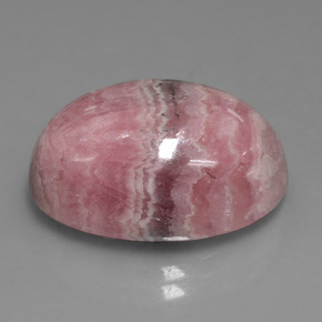 Rodocrosita multicolorido natural 25,74ct, corte oval, opaco