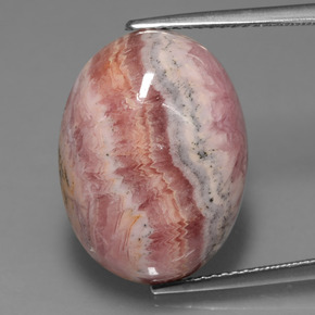 Rodocrosita multicolorido natural 23,35ct, corte oval, opaco
