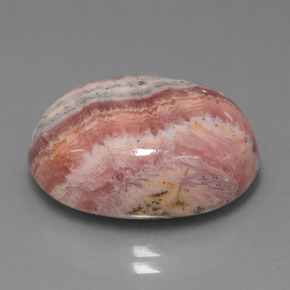 Rodocrosita multicolorido natural 23,35ct, corte oval, opaco