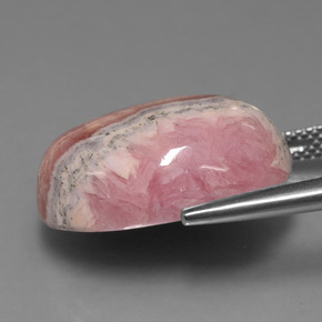 Rodocrosita multicolorido natural 23,35ct, corte oval, opaco