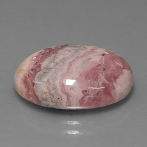 Rodocrosita multicolorido natural 13,41ct, corte oval, opaco