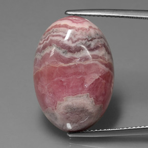 Rodocrosita multicolorido natural 26,95ct, corte oval, opaco