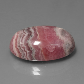 Rodocrosita multicolorido natural 26,95ct, corte oval, opaco