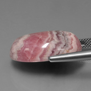 Rodocrosita multicolorido natural 26,95ct, corte oval, opaco
