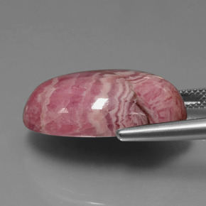 Rodocrosita multicolorido natural 32,83ct, corte oval, opaco