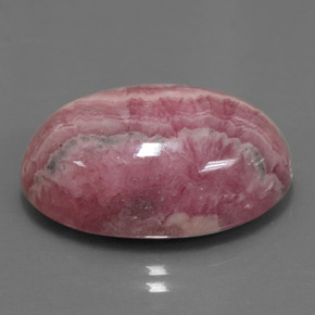 Rodocrosita multicolorido natural 29,62ct, corte oval, opaco