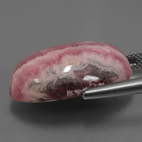 Rodocrosita multicolorido natural 29,62ct, corte oval, opaco