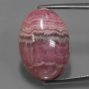 Rodocrosita multicolorido natural 33,91ct, corte oval, opaco