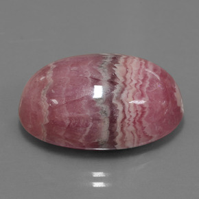 Rodocrosita multicolorido natural 33,91ct, corte oval, opaco