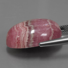 Rodocrosita multicolorido natural 33,91ct, corte oval, opaco