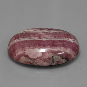 Rodocrosita multicolorido natural 52,06ct, corte oval, opaco