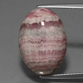 Rodocrosita multicolorido natural 17,09ct, corte oval, opaco