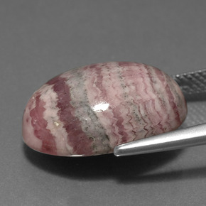 Rodocrosita multicolorido natural 17,09ct, corte oval, opaco