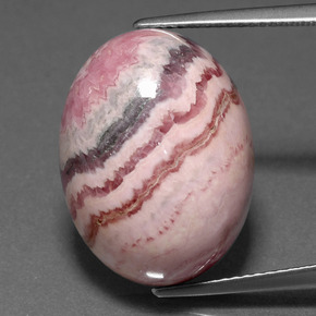 Rodocrosita multicolorido natural 23,72ct, corte oval, opaco
