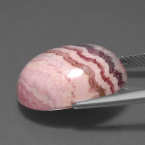 Rodocrosita multicolorido natural 23,72ct, corte oval, opaco