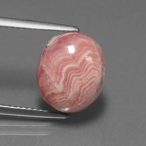 Rodocrosita multicolorido natural 6,39ct, corte oval, opaco