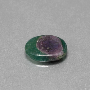 Rubi em fuchsita bicolor natural 2,25ct, corte oval, translúcido