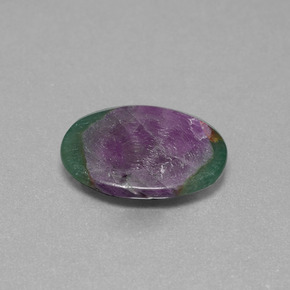 Rubi em fuchsita bicolor natural 4,55ct, corte oval, translúcido