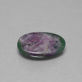 Rubi em fuchsita multicolorido natural 6,33ct, corte oval, translúcido