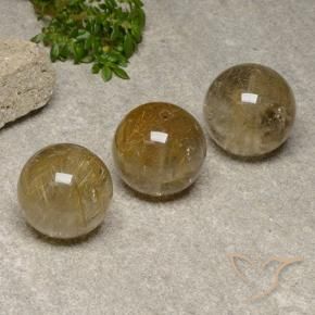 Pedras preciosas de Quartzo Rutilo Castanho Dourado Muito Claro natural de 55.78 ct, Esfera / Bola, Transparente