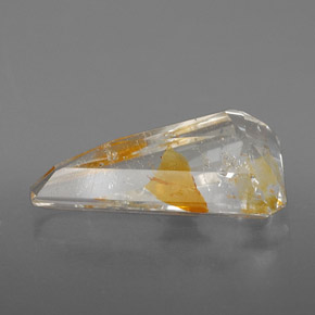 Topázio rutilado amarelo natural 6,31ct, forma extravagante, transparente