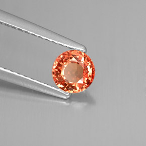 Safira laranja natural 0,59ct, corte redondo, VVS
